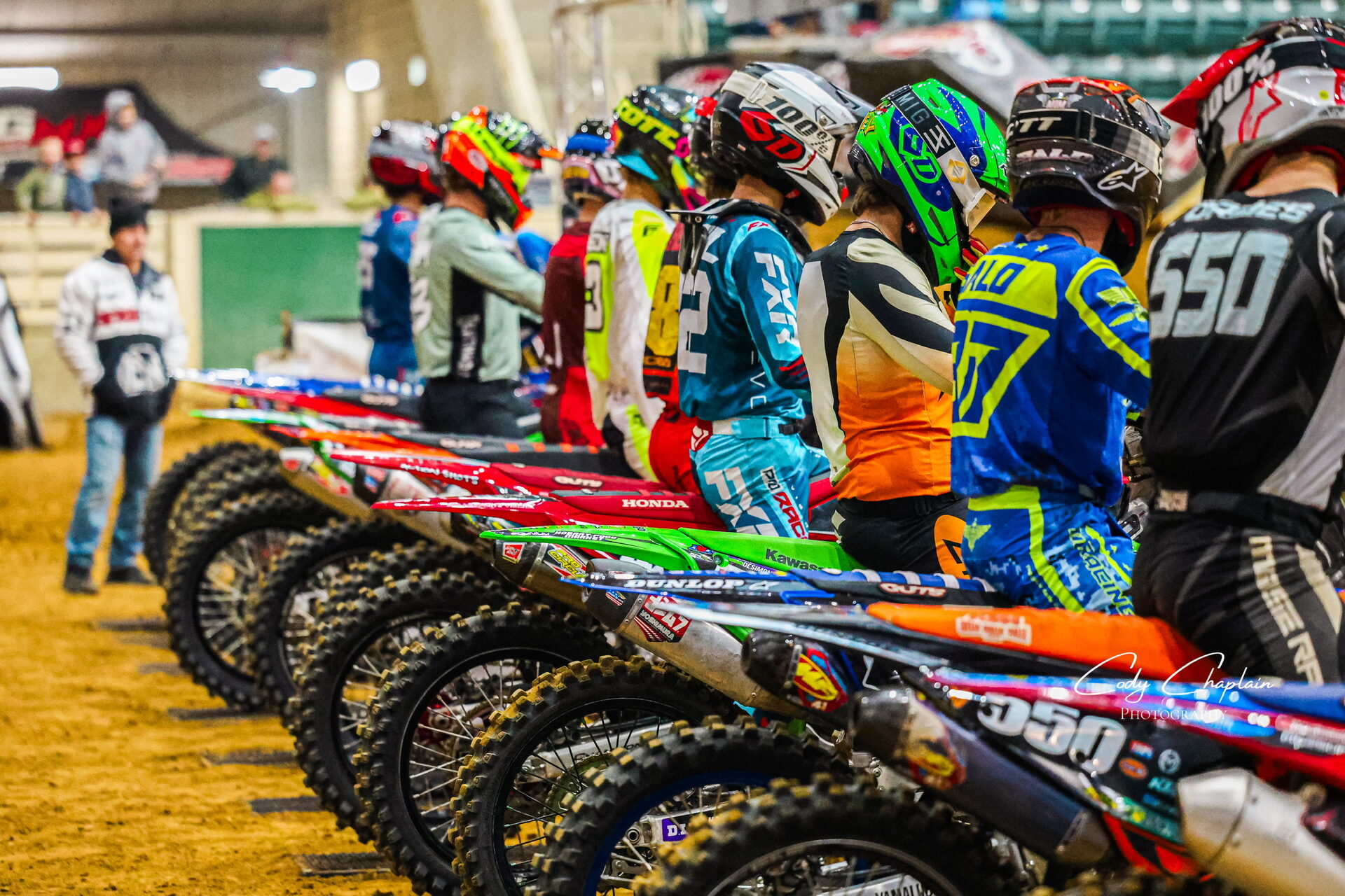 Rider throwing roost through a corner
