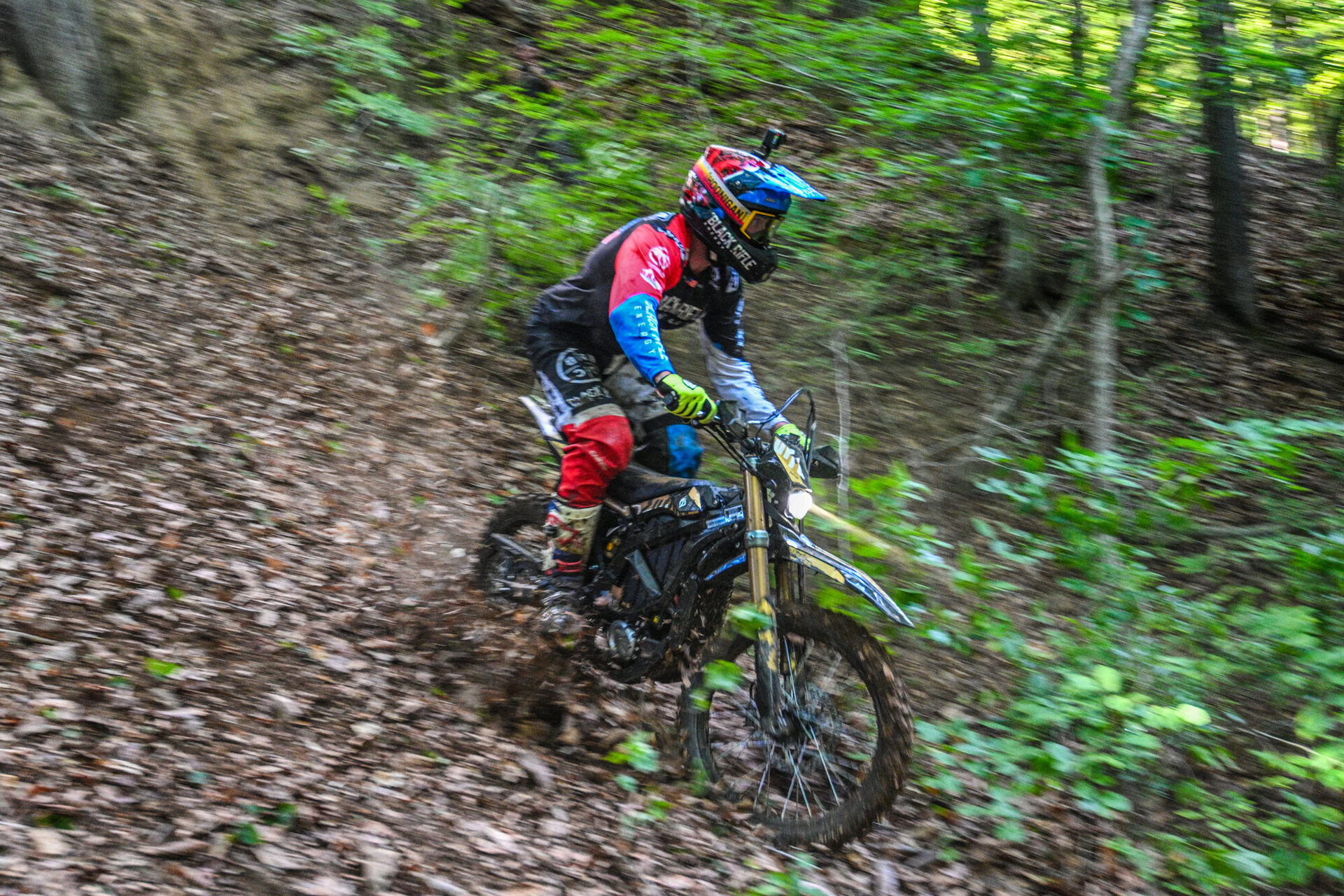 Electric moto action on the trail